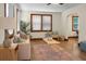 Cozy living room boasts hardwood floors and modern decor at 3935 Walnut St, North Charleston, SC 29405