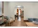 Bright living room featuring hardwood floors and an archway to dining room at 3935 Walnut St, North Charleston, SC 29405