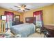 Cozy bedroom featuring a ceiling fan, carpet flooring, and traditional-style furniture at 4 Garth Dr, Charleston, SC 29414