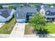 Aerial view of a well-maintained home with a lush, green yard in a Gathering-friendly neighborhood at 414 Dovetail Cir, Summerville, SC 29483