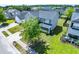 Aerial view of a lovely home with a spacious yard and beautiful landscaping at 414 Dovetail Cir, Summerville, SC 29483