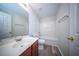 Functional bathroom with modern vanity, new flooring, and shower-tub combination at 414 Dovetail Cir, Summerville, SC 29483