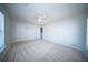 Clean bedroom with a ceiling fan and two doors at 414 Dovetail Cir, Summerville, SC 29483
