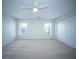 Cozy bedroom with neutral carpet, a ceiling fan, and a double window at 414 Dovetail Cir, Summerville, SC 29483