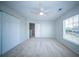 Cozy bedroom with a ceiling fan, window, and closet at 414 Dovetail Cir, Summerville, SC 29483