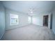 Neutral bedroom with new carpet, ceiling fan, bright window and closet at 414 Dovetail Cir, Summerville, SC 29483