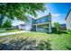 Inviting two-story home with a cozy front porch and well-kept lawn at 414 Dovetail Cir, Summerville, SC 29483