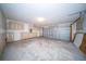Spacious two-car garage with concrete floor and unfinished drywall awaiting your personalization and customization at 414 Dovetail Cir, Summerville, SC 29483