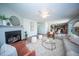 Spacious living room with fireplace, seating, and decor offers a comfortable and stylish gathering space at 414 Dovetail Cir, Summerville, SC 29483