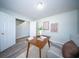 Functional office featuring a wooden desk, chair, and art for an inspiring atmosphere, perfect for concentration at 414 Dovetail Cir, Summerville, SC 29483
