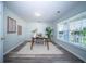Well-lit office with a window view, desk, chair, and stylish decor for a productive work environment at 414 Dovetail Cir, Summerville, SC 29483