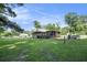 Spacious backyard featuring a deck and ample green space at 417 Dennis Ave, Moncks Corner, SC 29461