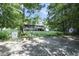 View of the backyard and back porch, filled with nature at 417 Dennis Ave, Moncks Corner, SC 29461