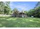 Charming home with a lush green lawn and mature trees at 417 Dennis Ave, Moncks Corner, SC 29461
