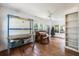 Spacious living room with hardwood floors, and a pegboard with a workbench for hobbies at 417 Dennis Ave, Moncks Corner, SC 29461