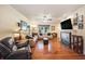 Cozy living room with hardwood floors, comfortable seating, and a fireplace at 417 Dennis Ave, Moncks Corner, SC 29461