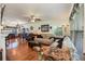 Open-concept living area with hardwood floors, a ceiling fan, and lots of natural light at 417 Dennis Ave, Moncks Corner, SC 29461
