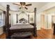 A relaxing bedroom with a four-poster bed and bench offers a serene retreat at 417 Dennis Ave, Moncks Corner, SC 29461
