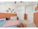 Comfortable bedroom featuring a warm two-tone color palette, with soft, inviting light and closet at 5032 Coral Reef Dr, Johns Island, SC 29455