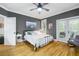 Bedroom featuring a bed, french doors, and ample natural light with hard wood floors at 5032 Coral Reef Dr, Johns Island, SC 29455