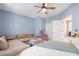 Bright bedroom with a cozy couch and toys; perfect for and guests at 5032 Coral Reef Dr, Johns Island, SC 29455