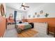 Cozy bedroom with modern decor, featuring warm earth-tone color blocking, and soft natural light at 5032 Coral Reef Dr, Johns Island, SC 29455