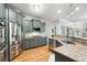 Kitchen boasts granite countertops, stainless appliances, and plenty of cabinet space at 5032 Coral Reef Dr, Johns Island, SC 29455
