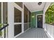 Charming screened-in porch with access to the backyard and plenty of natural light at 5032 Coral Reef Dr, Johns Island, SC 29455