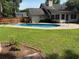 Beautiful in-ground pool with surrounding patio area, perfect for enjoying outdoor recreation and relaxation at 5445 Ansley Trl, North Charleston, SC 29418