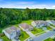 Beautiful aerial view of homes in a quiet neighborhood with lush green lawns and tree lined streets at 578 Mountain Laurel Cir, Goose Creek, SC 29445