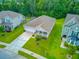 Aerial view of a charming home with a well-manicured lawn, mature trees, and inviting curb appeal at 578 Mountain Laurel Cir, Goose Creek, SC 29445