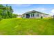 Beautiful backyard with lush lawn and mature trees, perfect for outdoor activities at 578 Mountain Laurel Cir, Goose Creek, SC 29445