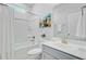 Bathroom showcasing a shower/tub combination, vanity with sink, and coastal-themed artwork at 578 Mountain Laurel Cir, Goose Creek, SC 29445