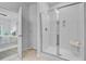Bathroom showcasing a clear glass shower with a white bench at 578 Mountain Laurel Cir, Goose Creek, SC 29445