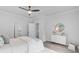 Bright bedroom featuring wood-look floors, ceiling fan and neutral decor at 578 Mountain Laurel Cir, Goose Creek, SC 29445