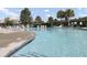 Large community pool with chairs and umbrellas, a perfect place to relax and cool off in the summer at 578 Mountain Laurel Cir, Goose Creek, SC 29445
