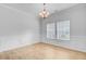 Elegant dining room with wainscoting, hardwood floors, and bright windows at 578 Mountain Laurel Cir, Goose Creek, SC 29445