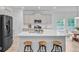 Kitchen showcases a central island with bar stool seating and stainless steel appliances at 578 Mountain Laurel Cir, Goose Creek, SC 29445