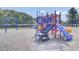 Community playground with colorful climbing structures, slides, and swings set for children of all ages at 578 Mountain Laurel Cir, Goose Creek, SC 29445