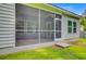 A serene screened in porch overlooking the well-maintained backyard at 578 Mountain Laurel Cir, Goose Creek, SC 29445