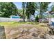 Large backyard with mature trees and storage at 5806 Robinhood Dr, Hanahan, SC 29410