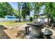 Large fenced backyard with picnic tables, storage shed and covered patio at 5806 Robinhood Dr, Hanahan, SC 29410