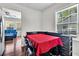 Cozy dining area with hardwood floors, natural light, and an open view to a living room, enhancing the space at 5806 Robinhood Dr, Hanahan, SC 29410