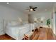 Cozy bedroom with two beds, classic decor, hardwood floors and comfortable setting at 601 Ocean Blvd, Isle of Palms, SC 29451