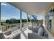 Spacious porch with ample seating and ocean views at 601 Ocean Blvd, Isle of Palms, SC 29451