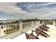 Coastal home roof deck with chairs overlooking the ocean, offering stunning views and relaxation at 601 Ocean Blvd, Isle of Palms, SC 29451
