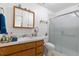 Bathroom with a vanity, medicine cabinet, toilet, and a glass-enclosed shower at 617 Willdrew Ln, Moncks Corner, SC 29461