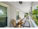 Inviting front porch with comfortable seating, offering a relaxing outdoor space with views of the surrounding neighborhood at 617 Willdrew Ln, Moncks Corner, SC 29461