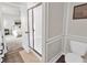 Ensuite bathroom featuring a glass shower and decorative wall trim at 716 Mcroy St, Moncks Corner, SC 29461