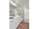 A neutral bathroom featuring white vanity, tile flooring and a shower at 716 Mcroy St, Moncks Corner, SC 29461
